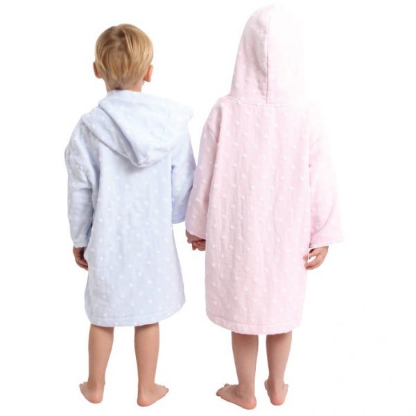 A Boy And A Girl Wearing Size 3-5 AM PM Muslin Hooded Robes In Light Blue And Light Pink Back View